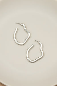 Irregular shape metal hoop earrings